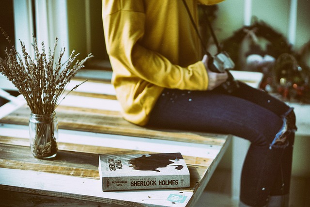 author sitting at table during book signing